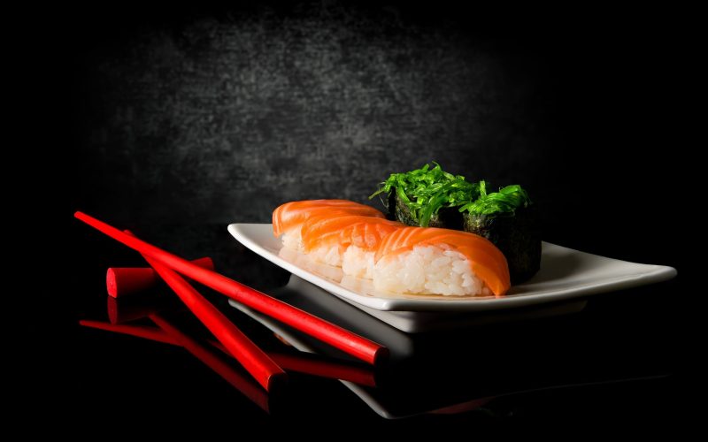 sushi-chopsticks-black-background